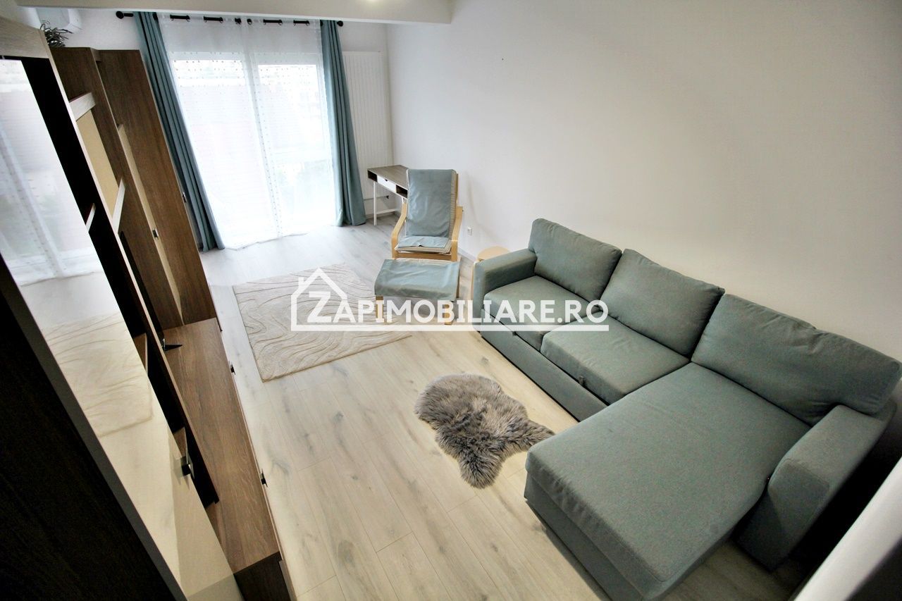 Apartament 1 camera in bloc NOU,46 mp,1 parcare privată