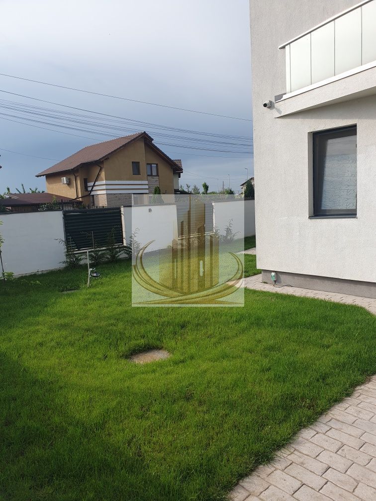Casă modernă cu teren generos și garaj – Dumbrăvița