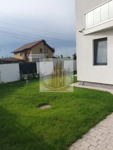 Casă modernă cu teren generos și garaj – Dumbrăvița