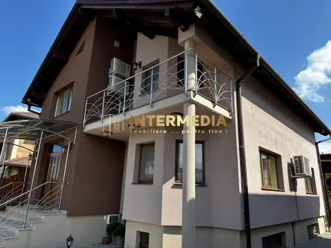 Casa D+P+M cu garaj teren 400 mp finisata utilata mobilata asfal CETATE Giro