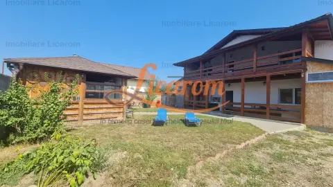 Proprietate in Cristian cu trei constructii+o fundatie,450000euro